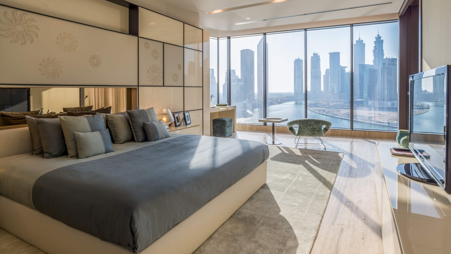 Luxurious living room in five-bedroom penthouse, Volante Tower, Business Bay, featuring elegant decor