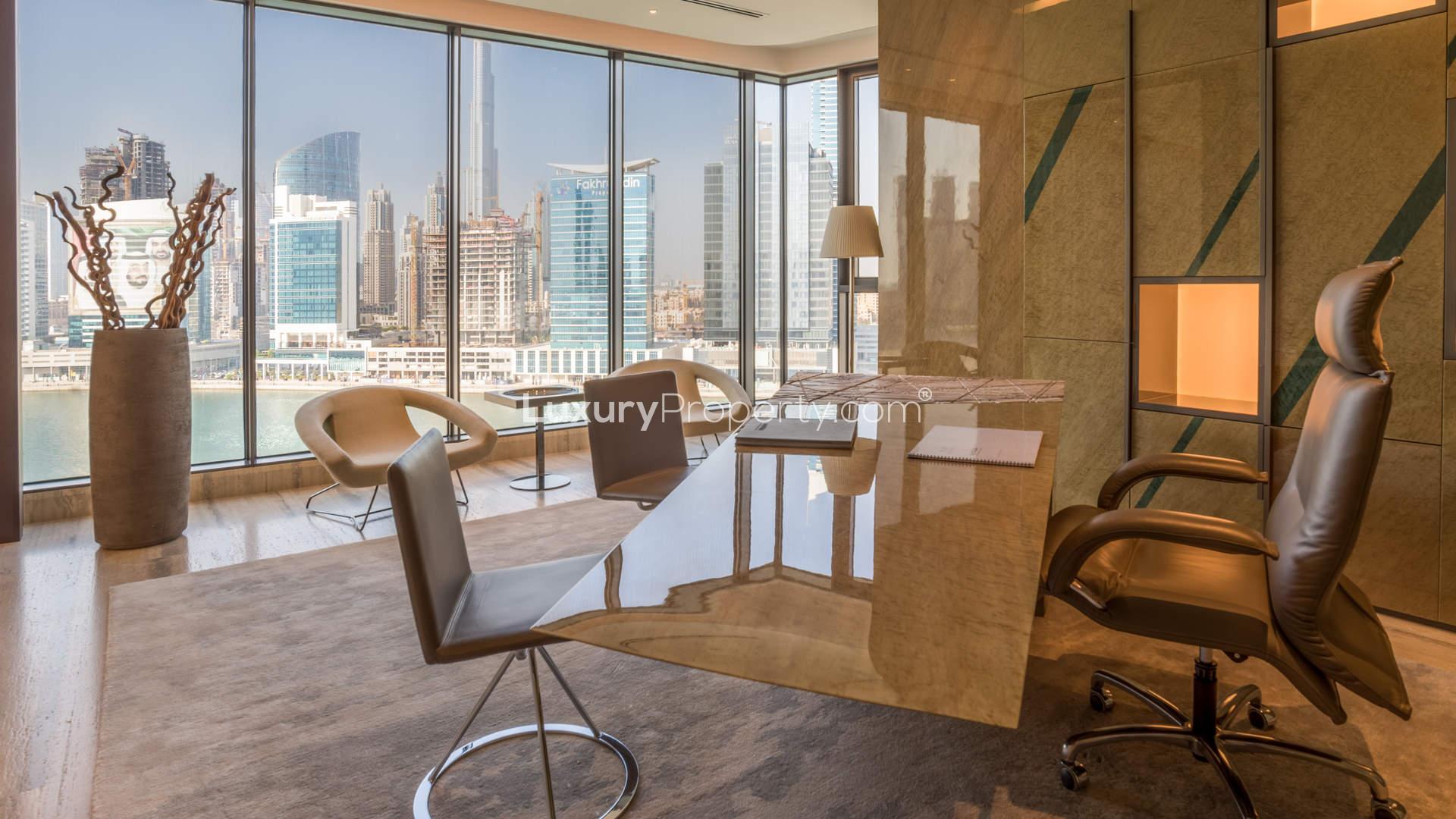 Luxurious Business Bay penthouse living room with stunning canal and Burj Khalifa views