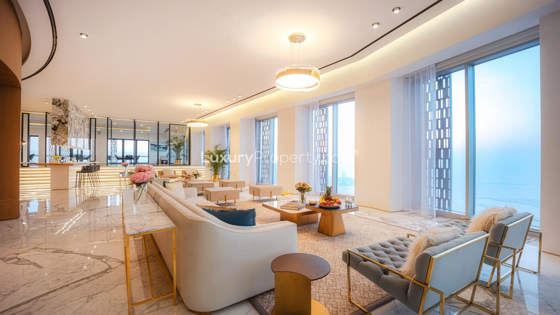 Indoor pool and seating area in luxurious Dubai Marina penthouse, Cayan Tower