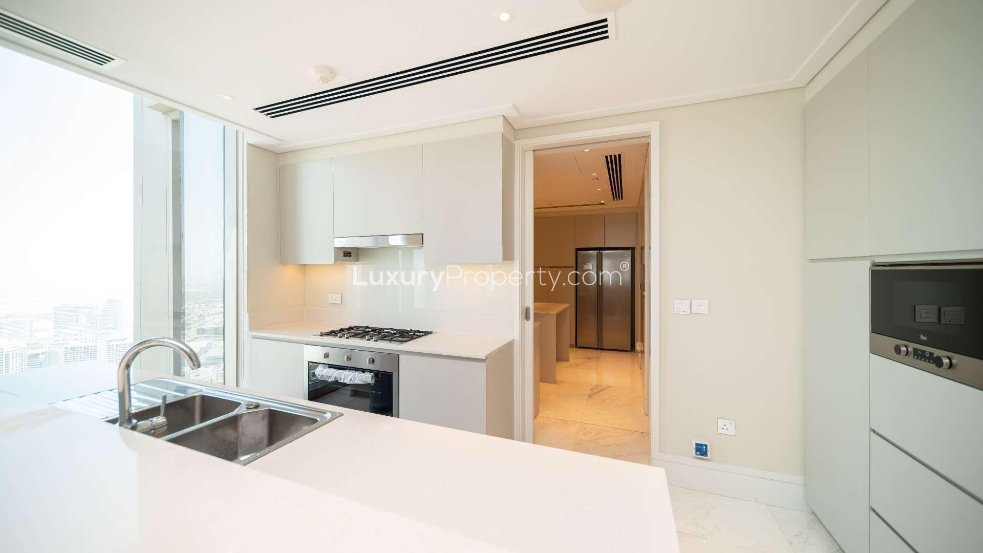 Dining area in luxurious Vida Residence Downtown penthouse, featuring elegant table setting and decor
