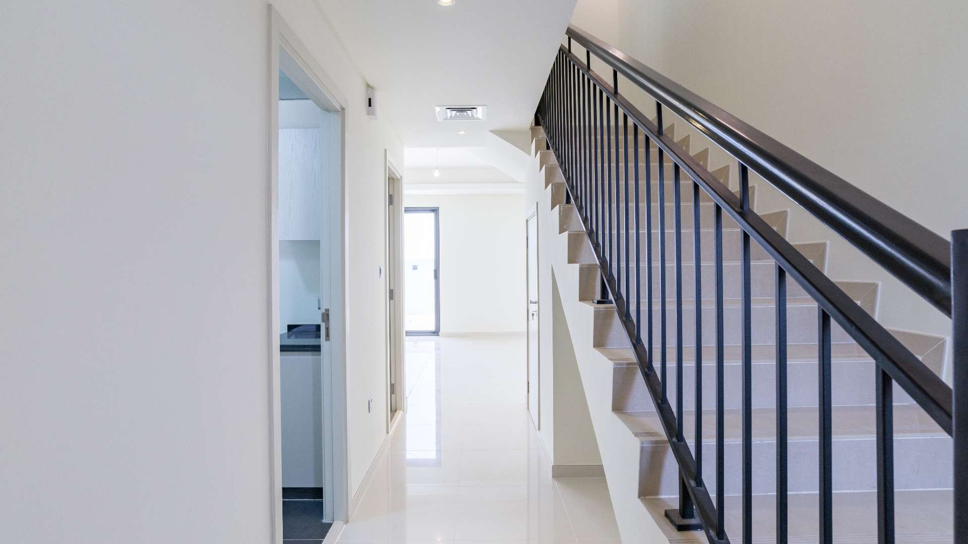 Modern five-bedroom townhouse exterior in Aster, Damac Hills 2, available for rent