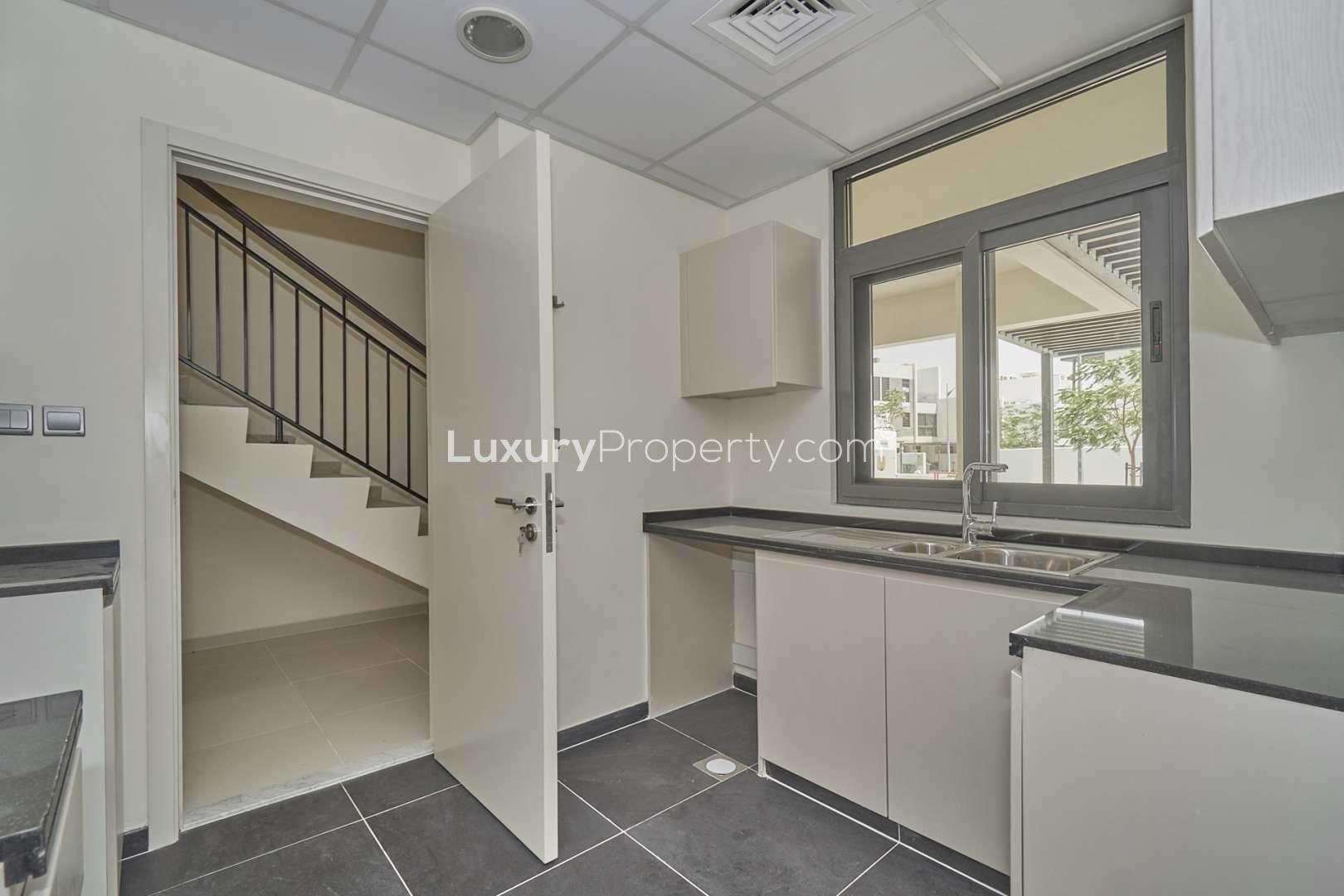 Brand new 5-bedroom townhouse exterior in Claret, Akoya, available for rent