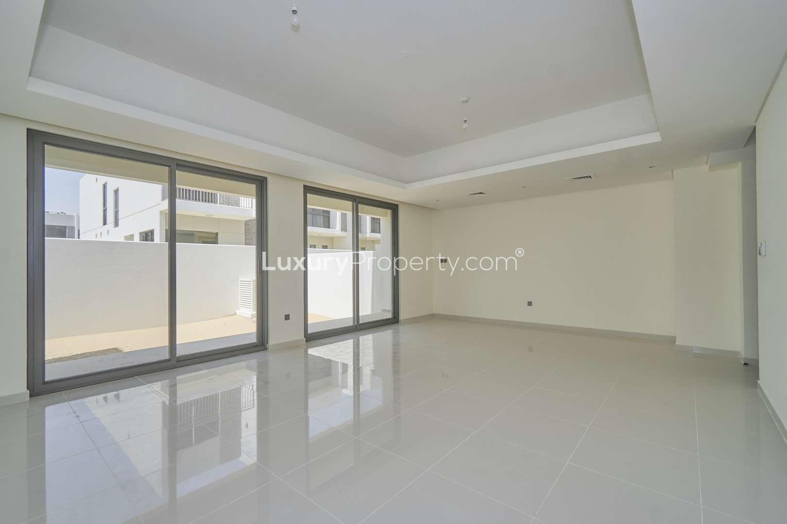 N/A,Bright living room in brand new 5-bedroom townhouse, Claret Akoya, desert view