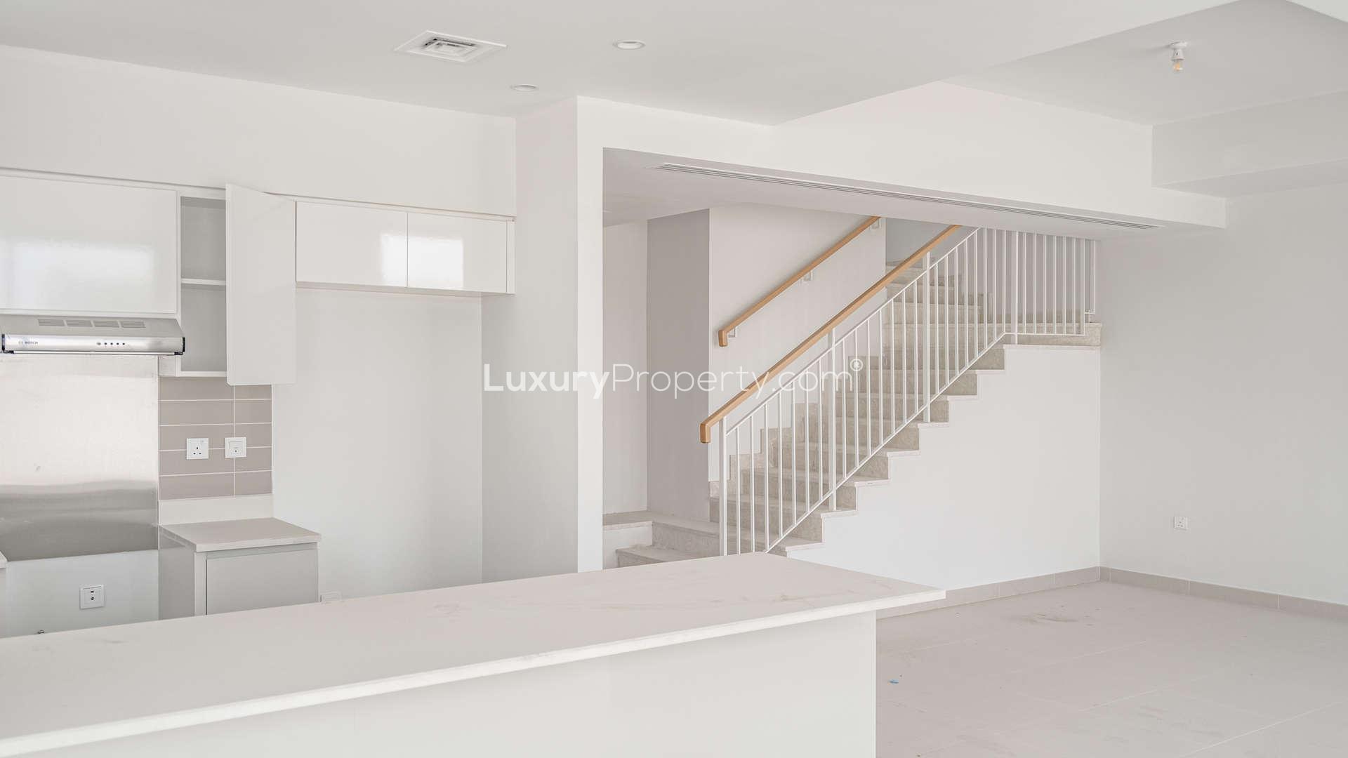Empty room in 5-bedroom townhouse, Maple, Dubai Hills Estate, featuring modern finishes