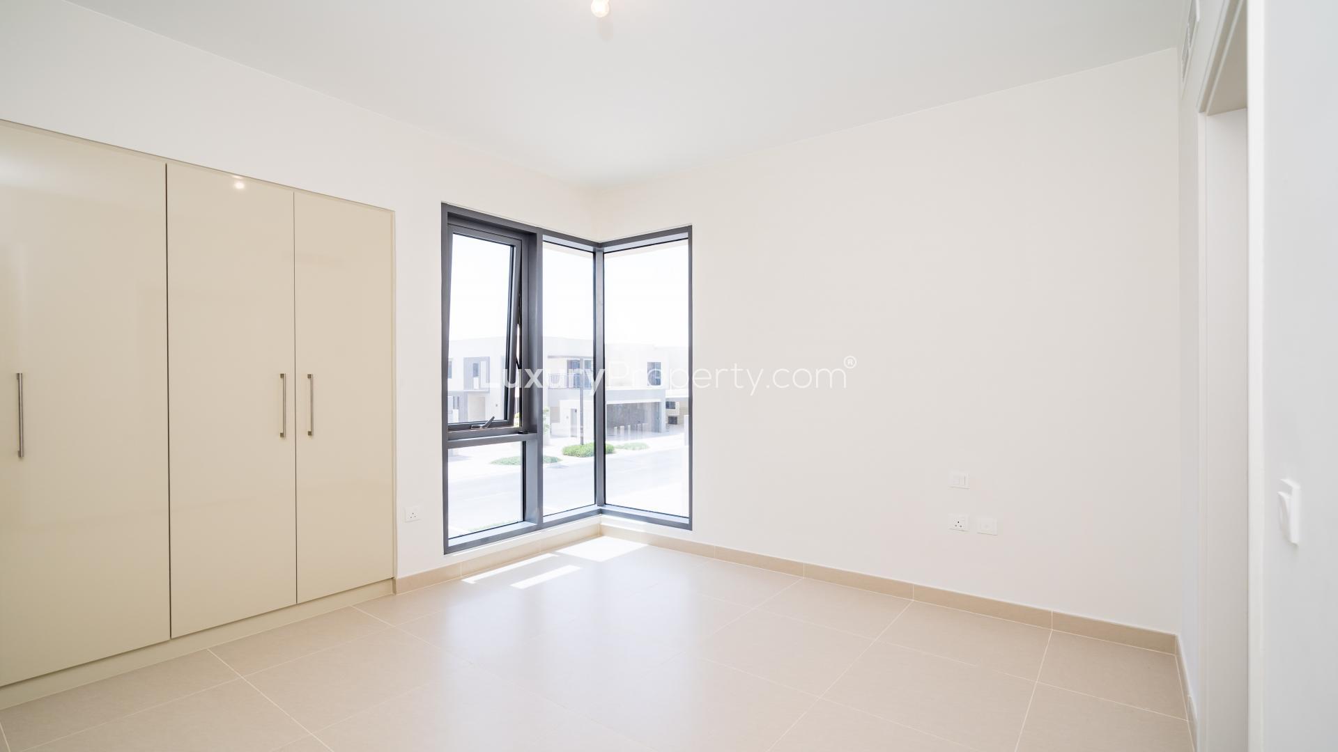 Modern kitchen and staircase in Dubai Hills Estate townhouse for rent, Maple community