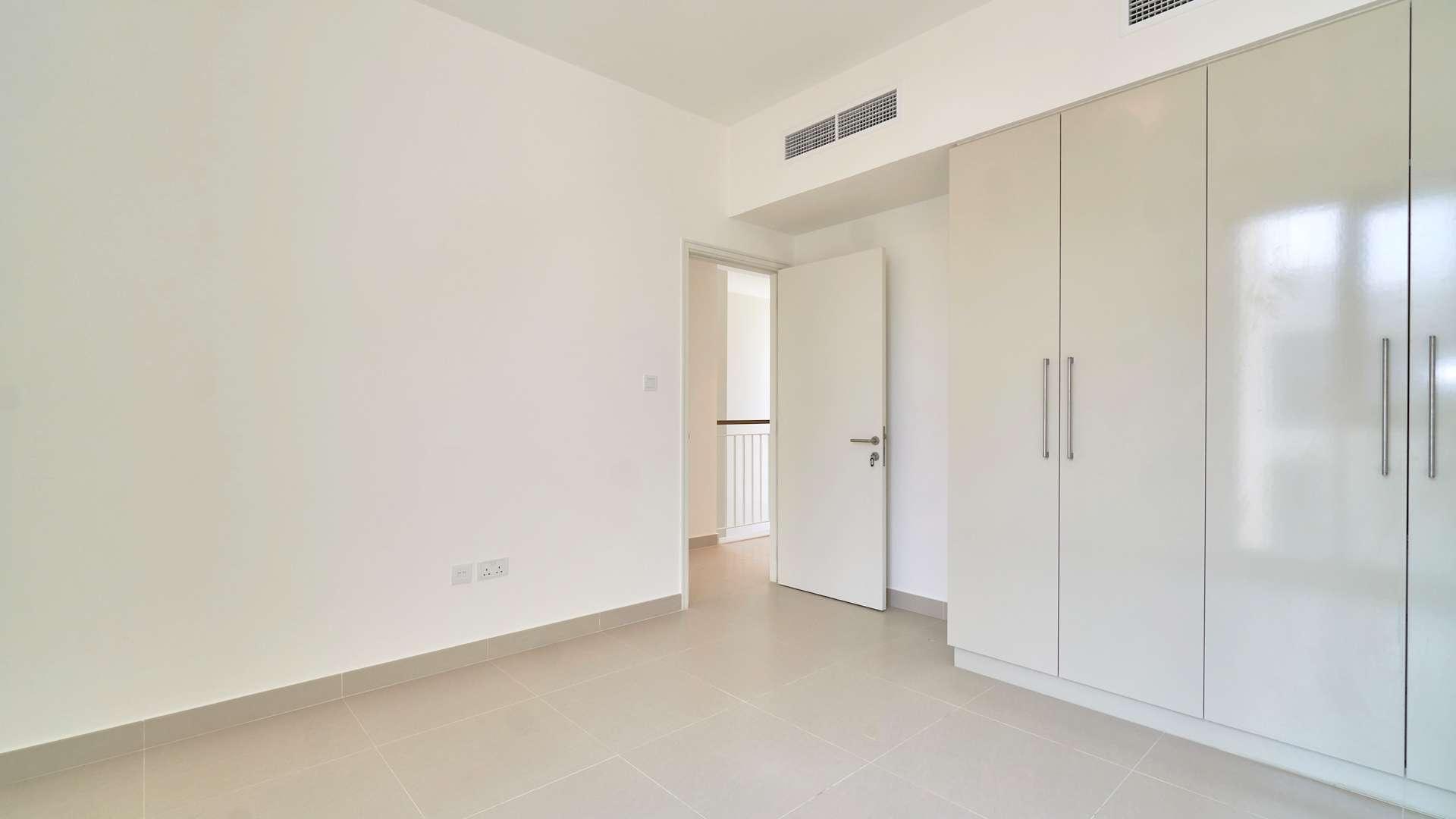 Empty bedroom with built-in wardrobes in Dubai Hills Estate townhouse for rent