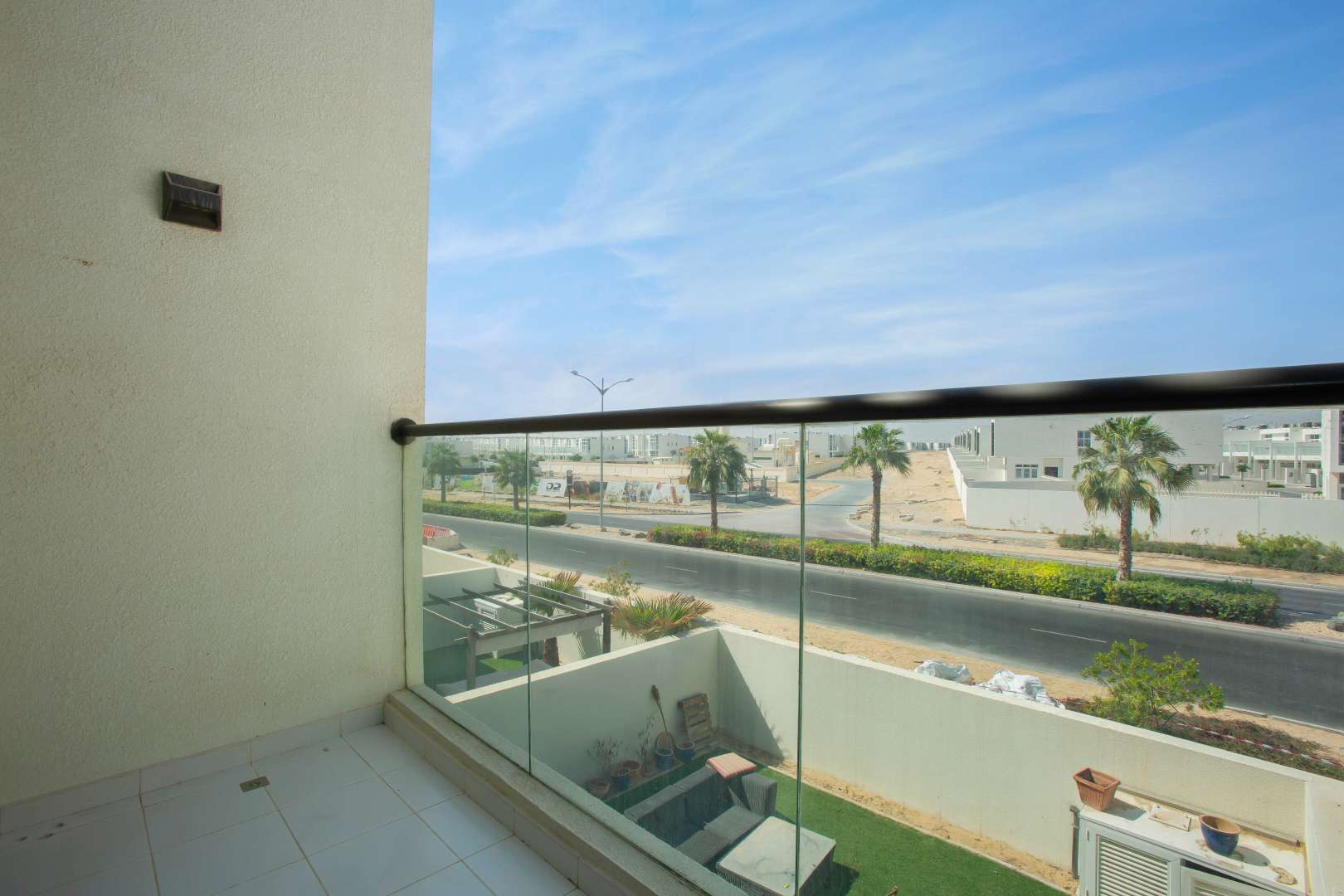 Modern 5-bedroom townhouse exterior with patio in Amazonia, Akoya Dubai for sale