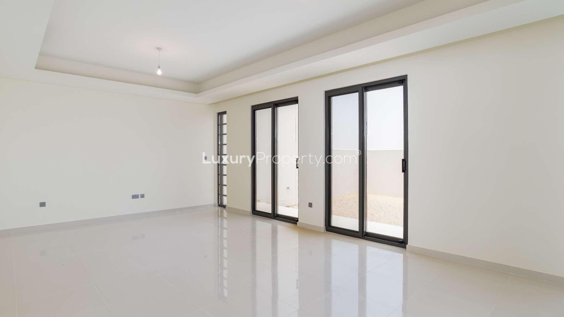 Spacious living area in five-bedroom townhouse for sale, Claret, Damac Hills 2