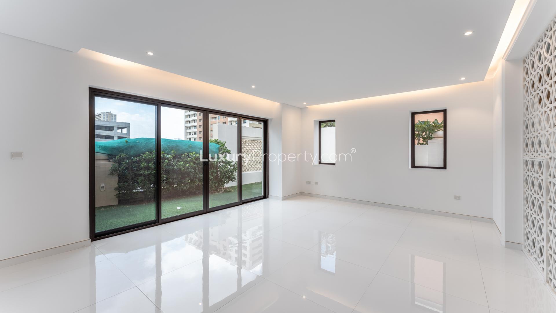 Upgraded 5-bedroom townhouse exterior in gated Bloomingdale, Dubai Sports City for sale