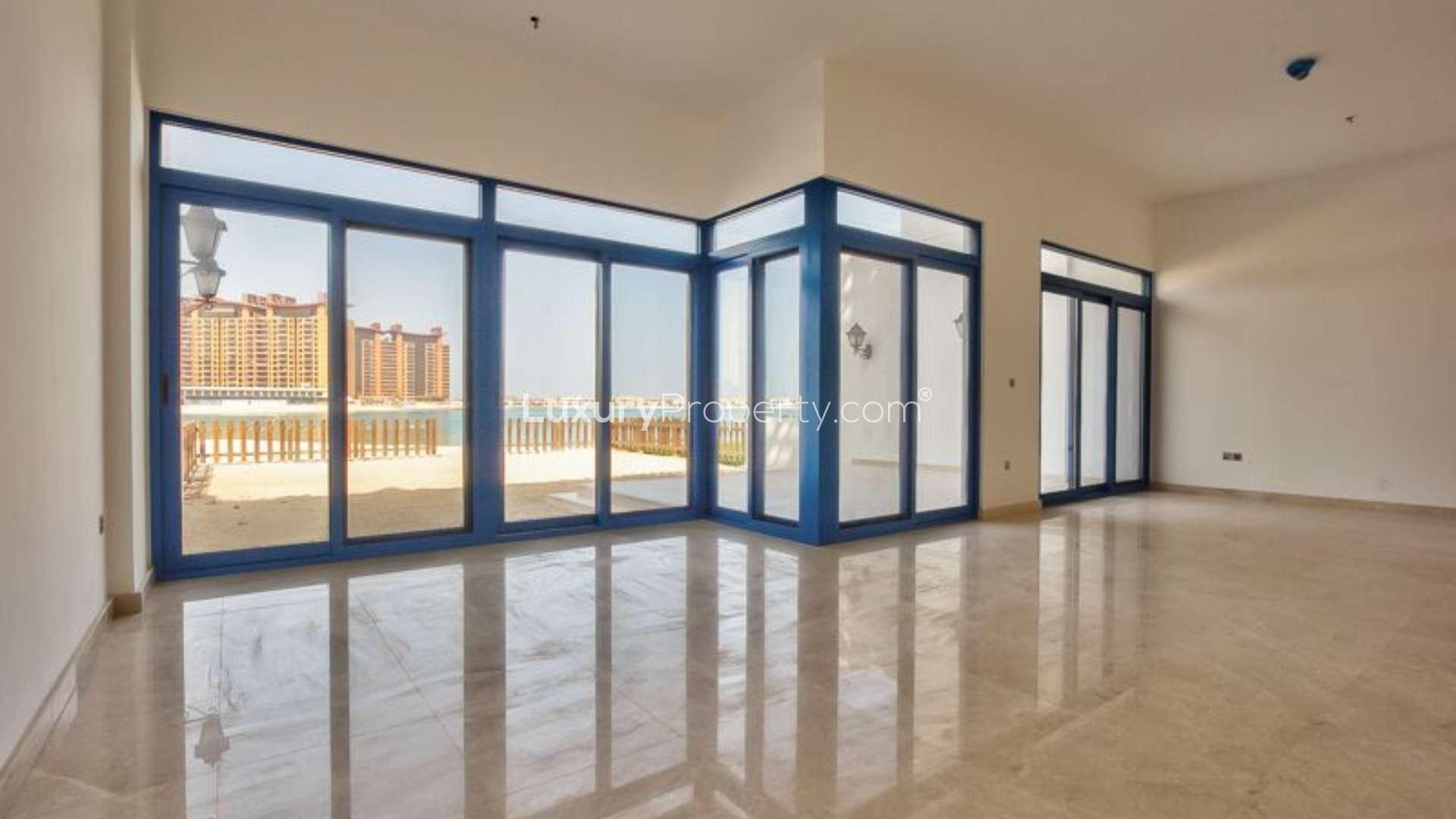 "Stunning beachfront view from Type 1B Villa in Palma Residences, Palm Jumeirah.",Luxurious villa interior with ocean view, Palma Residences, Palm Jumeirah, for sale