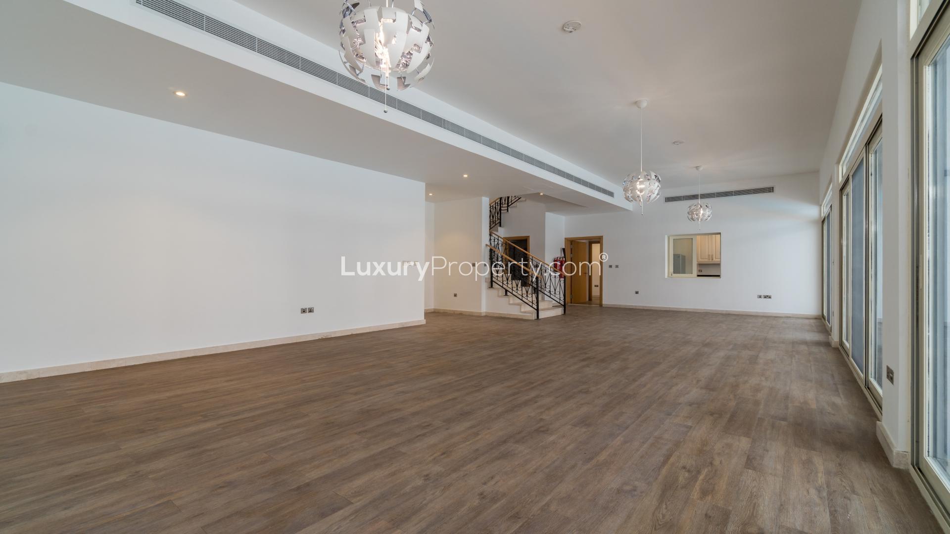 Spacious Palma Residences townhouse interior with pool view, Palm Jumeirah, for sale