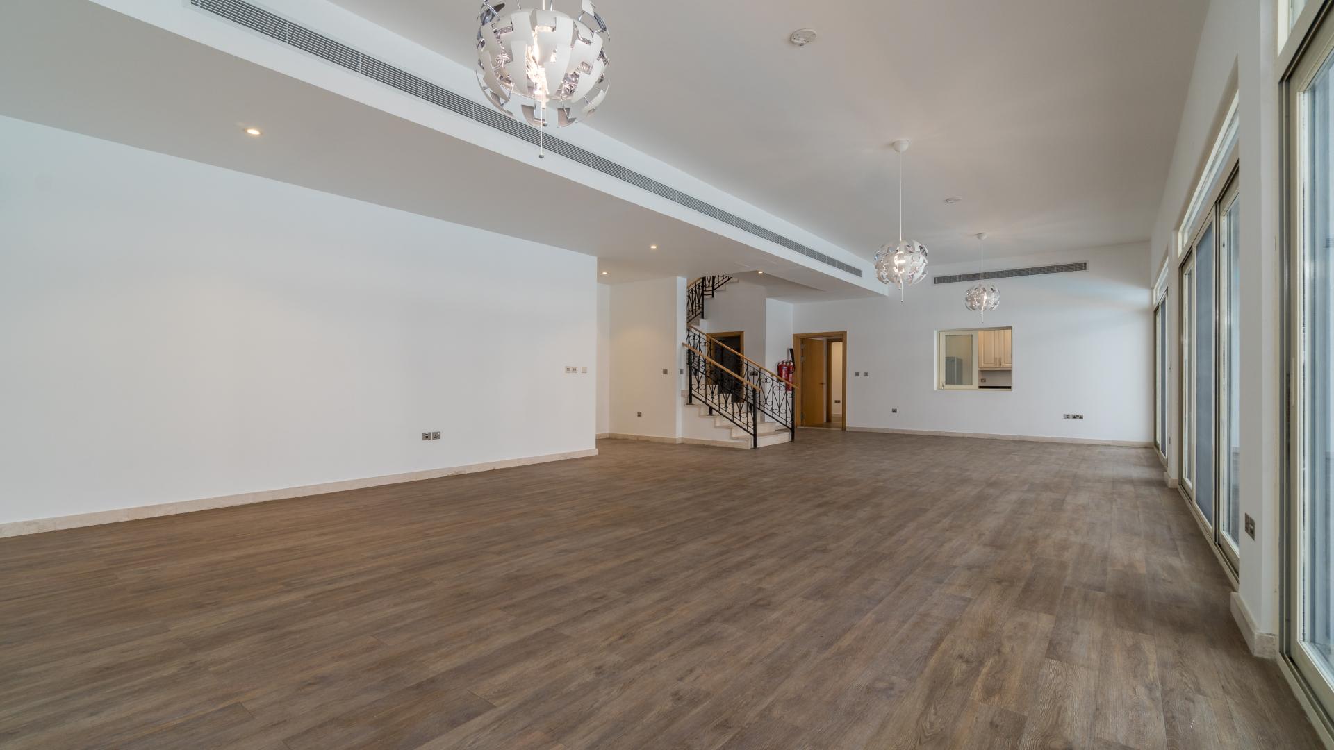 Spacious Palma Residences townhouse interior with pool view, Palm Jumeirah, for sale