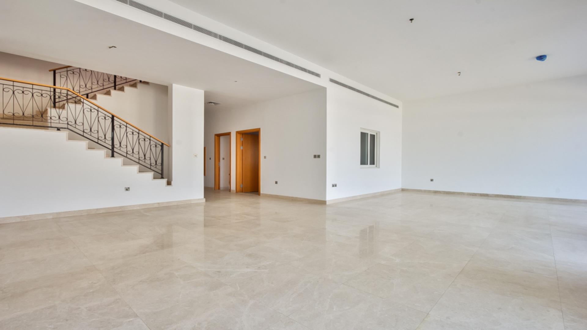 Beachfront view from Palma Residences townhouse, Palm Jumeirah, with skyline in the distance