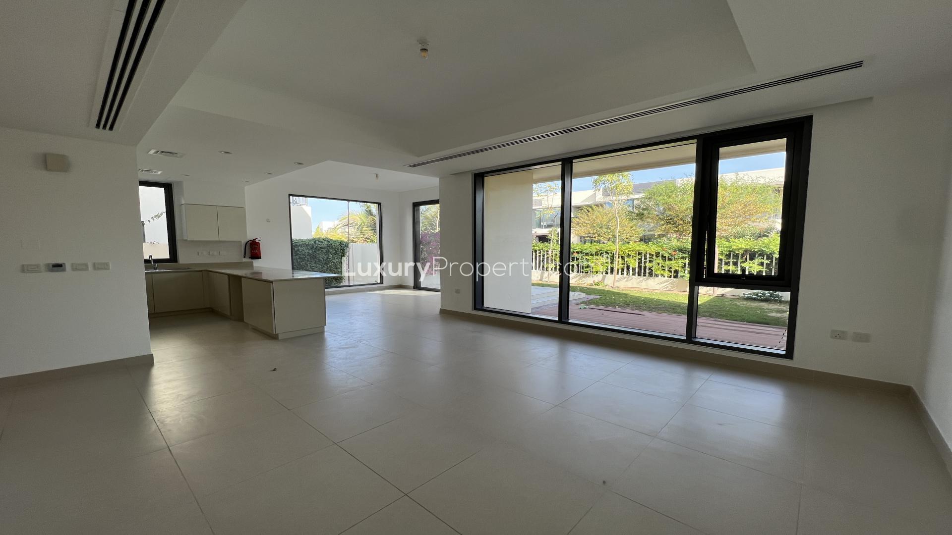 Exterior view of 5-bed villa in Maple, Dubai Hills Estate with garden and patio