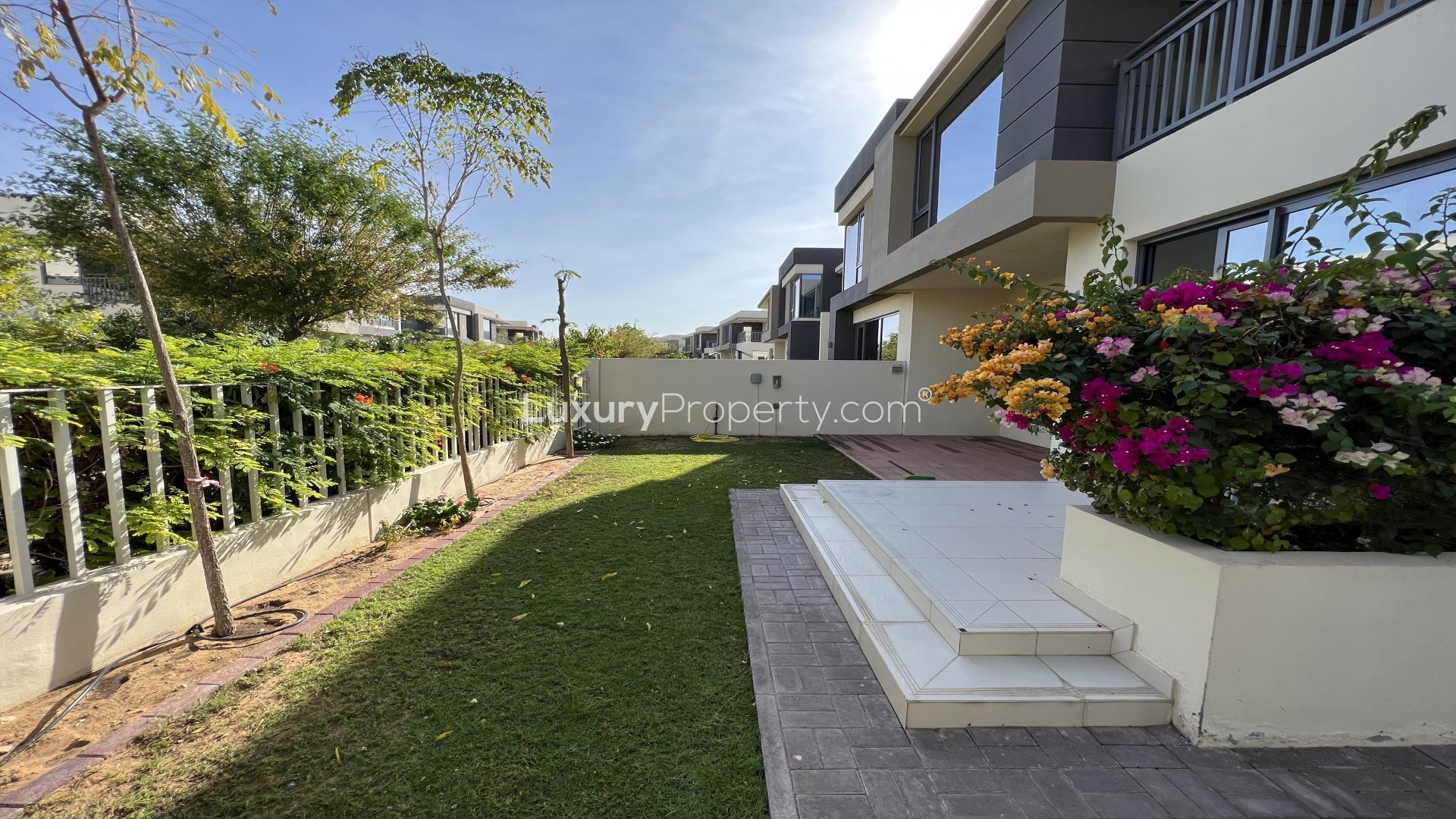 Spacious living area with large windows in 5-bed villa, Maple at Dubai Hills Estate