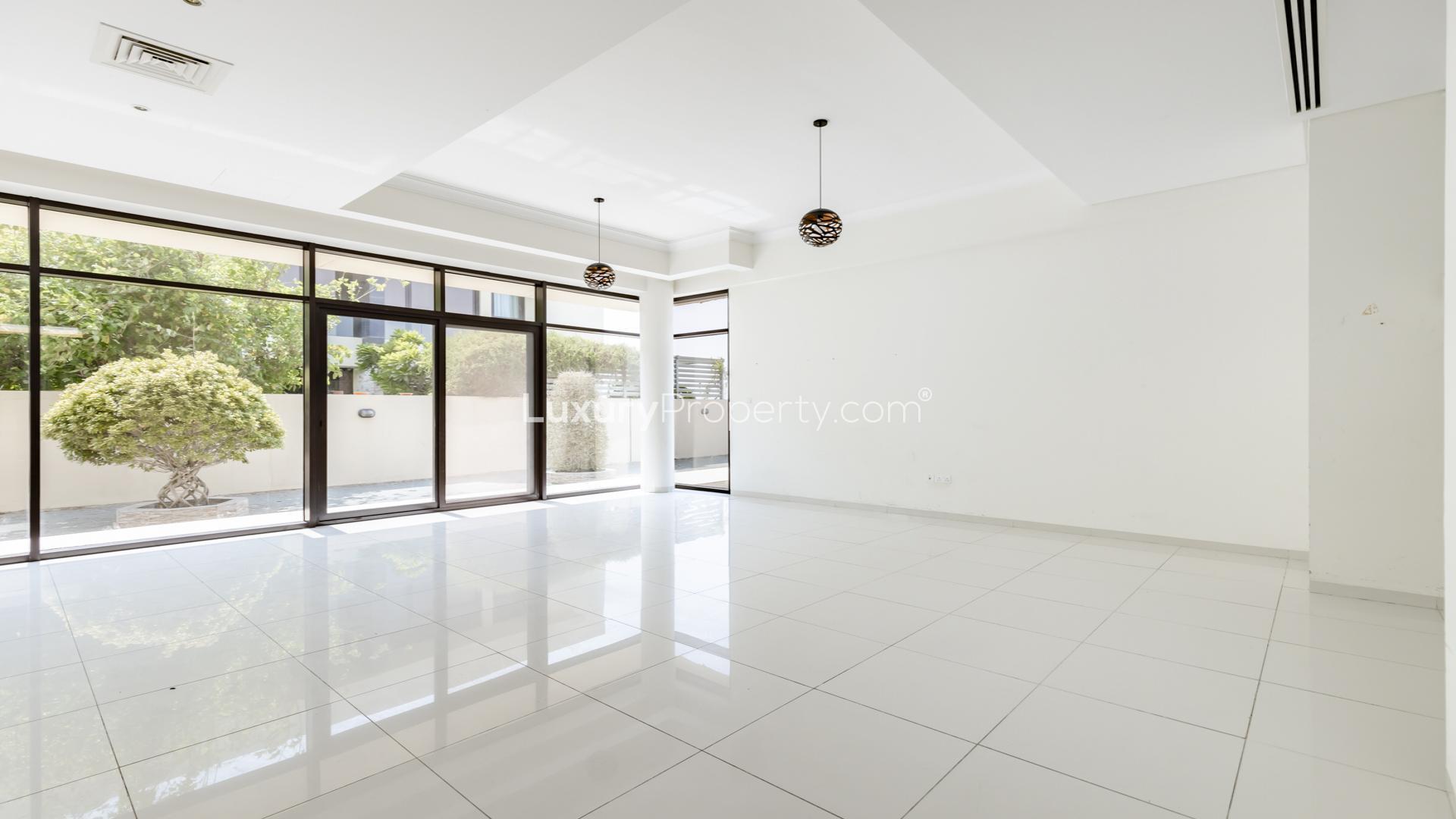 Modern 5-bedroom villa exterior in Queens Meadow, Damac Hills, available for rent