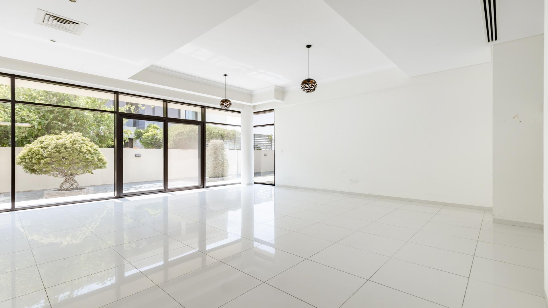 Modern 5-bedroom villa exterior in Queens Meadow, Damac Hills, available for rent