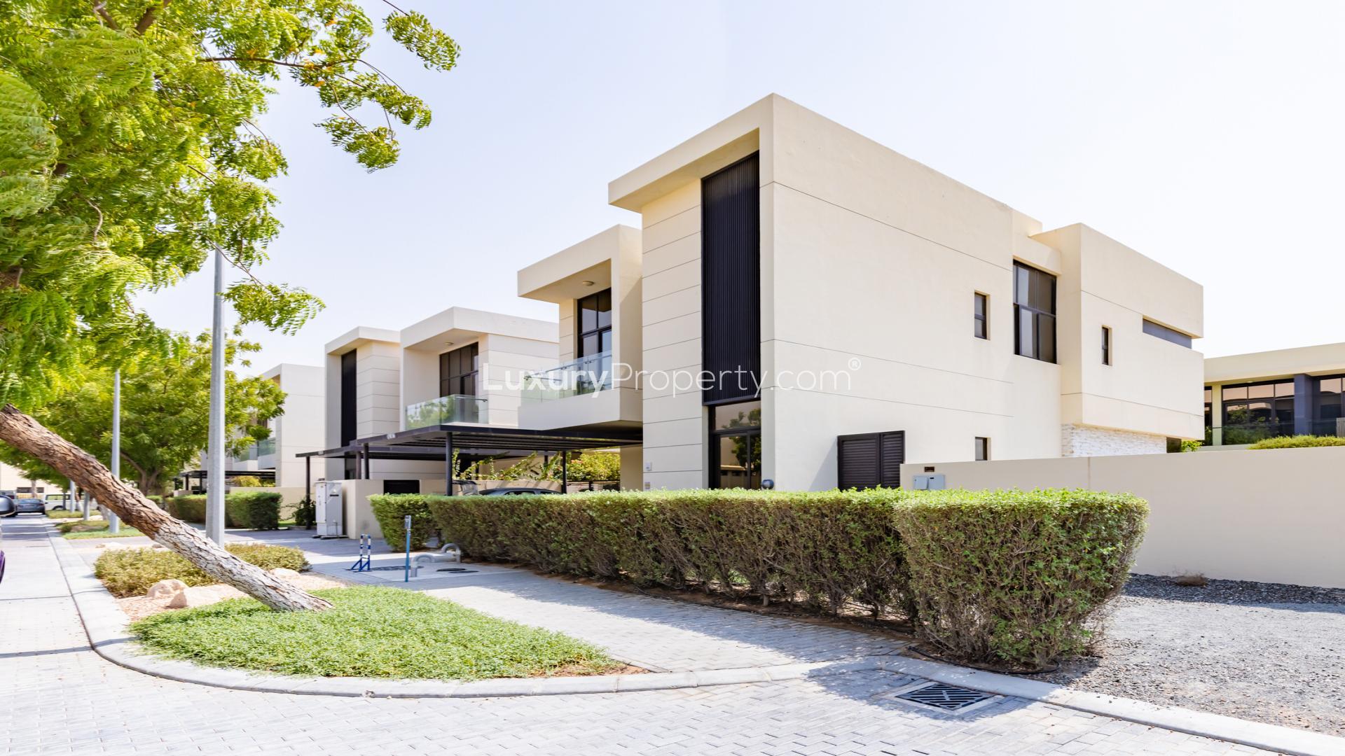 Bright, spacious living area in 5-bed villa, Queens Meadow, Damac Hills, for rent
