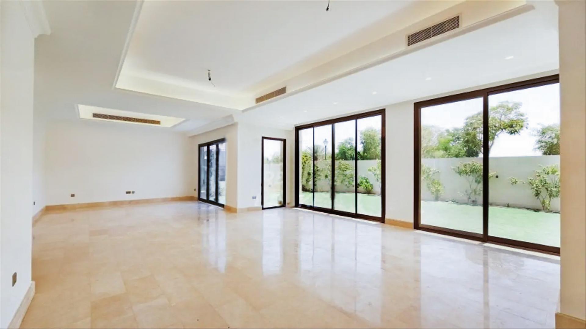 Stunning 5-bedroom villa exterior with lush garden in Aseel, Arabian Ranches for rent