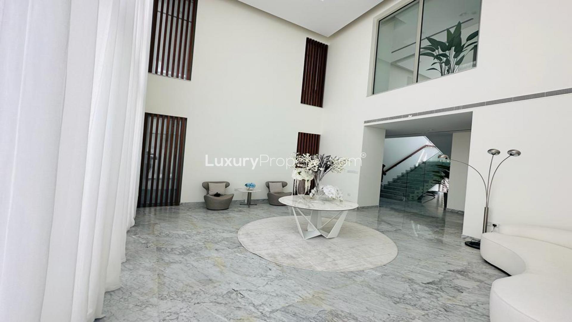 Expansive villa exterior with lush landscaping in District One, Mohammed Bin Rashid City