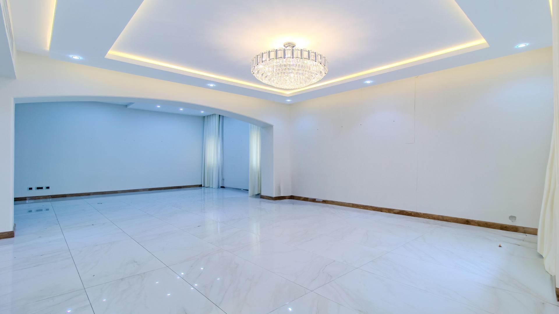 Spacious living room with chandelier in upgraded Meadows villa for rent, LP40176