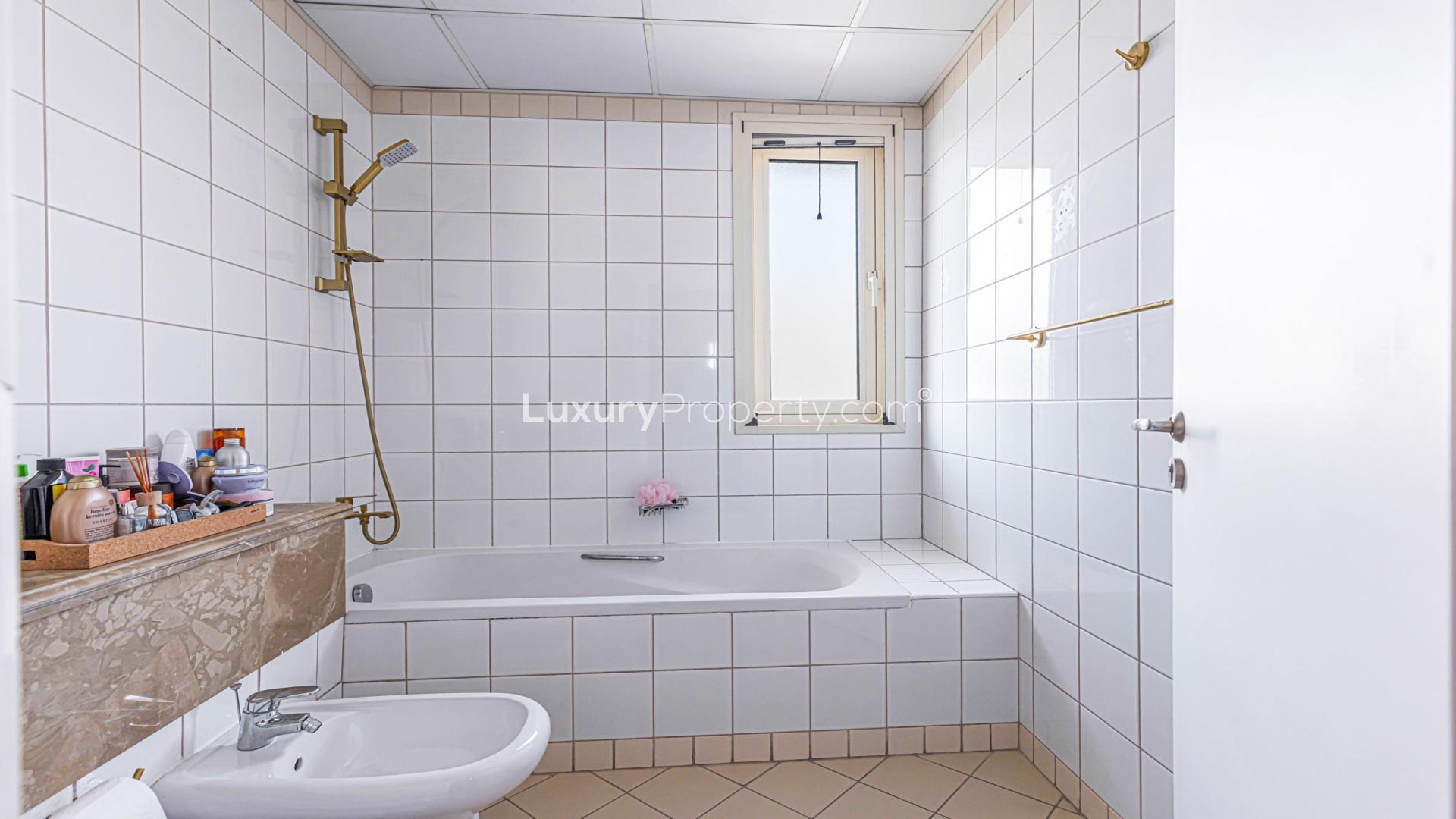 Modern living room in upgraded Saheel villa, Arabian Ranches, with elegant decor and bright lighting