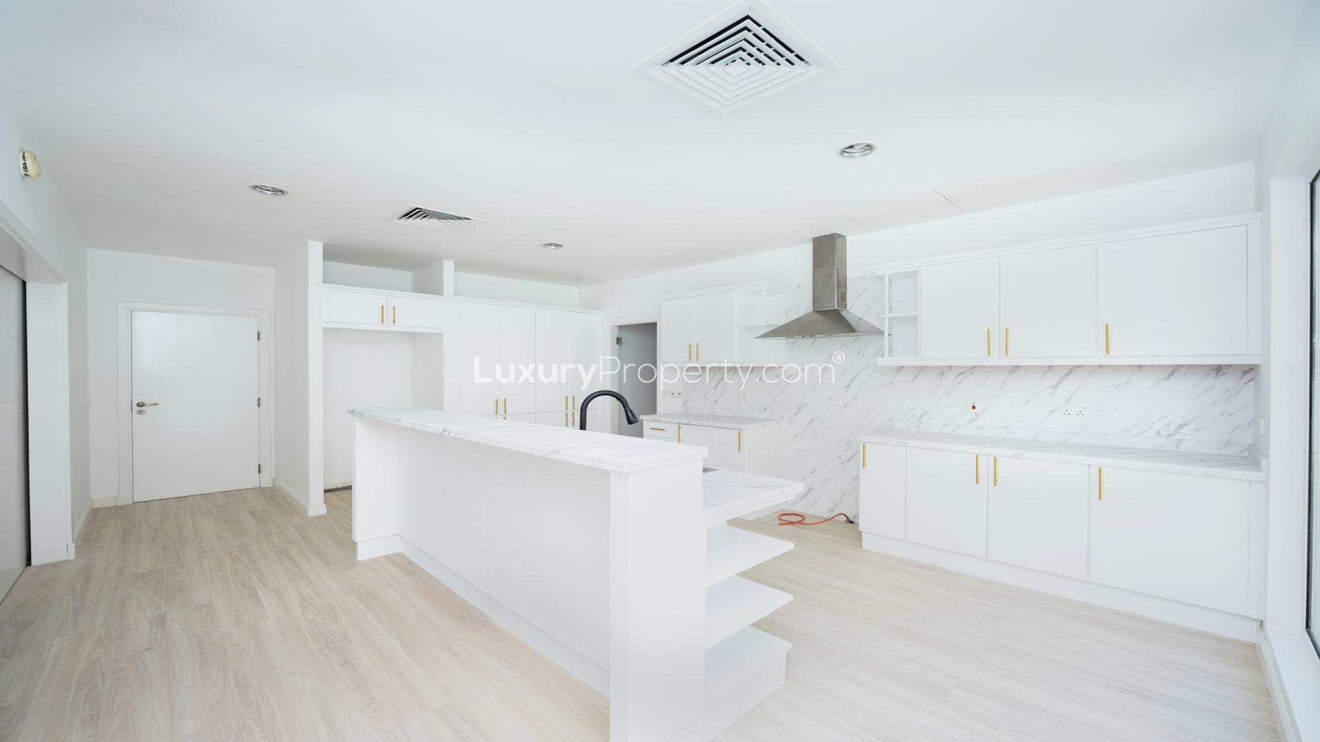 Modern kitchen with marble countertops in 5-bedroom villa, Saheel, Arabian Ranches for rent