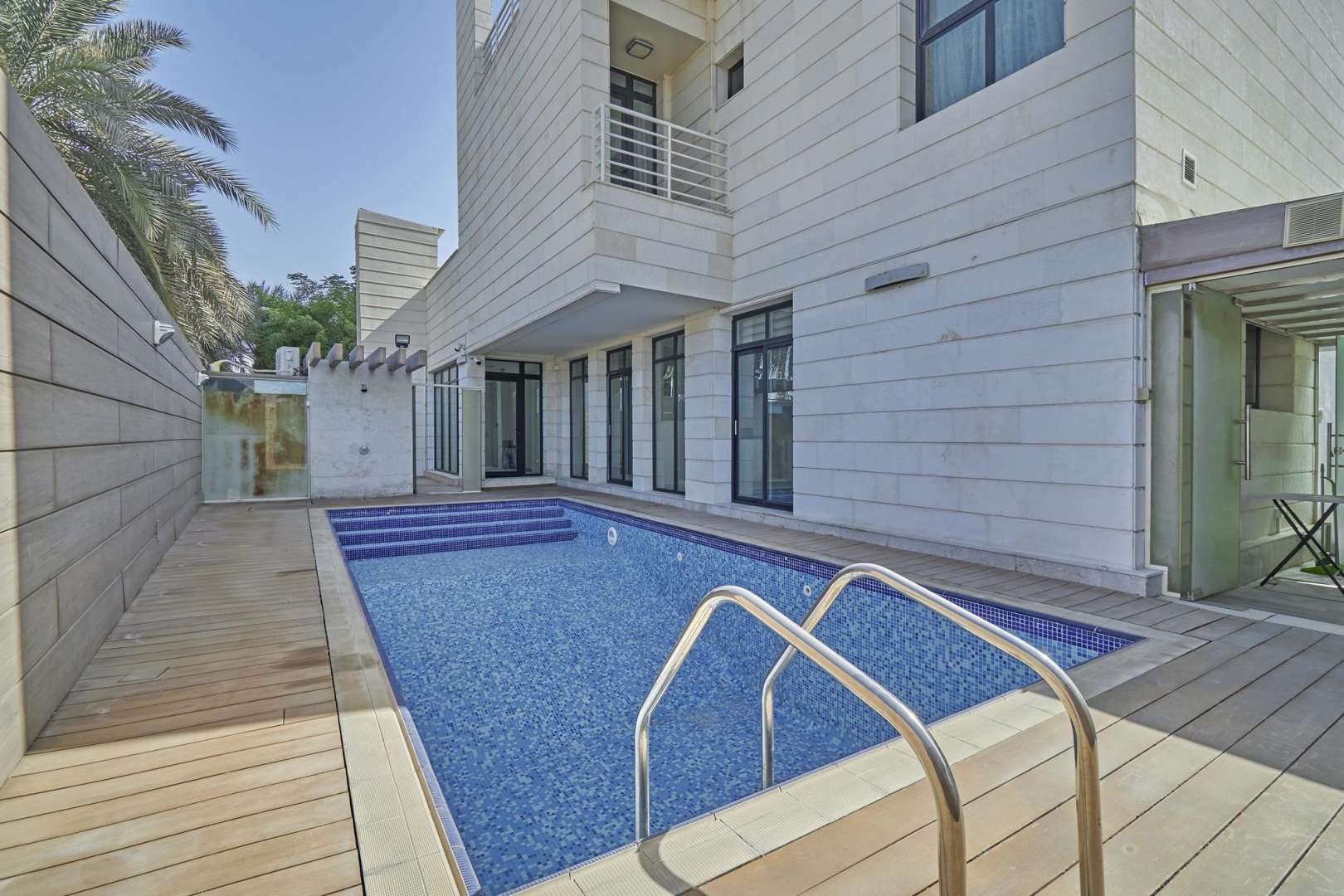 Covered driveway with greenery at luxurious 5-bedroom villa in Al Sufouh 1