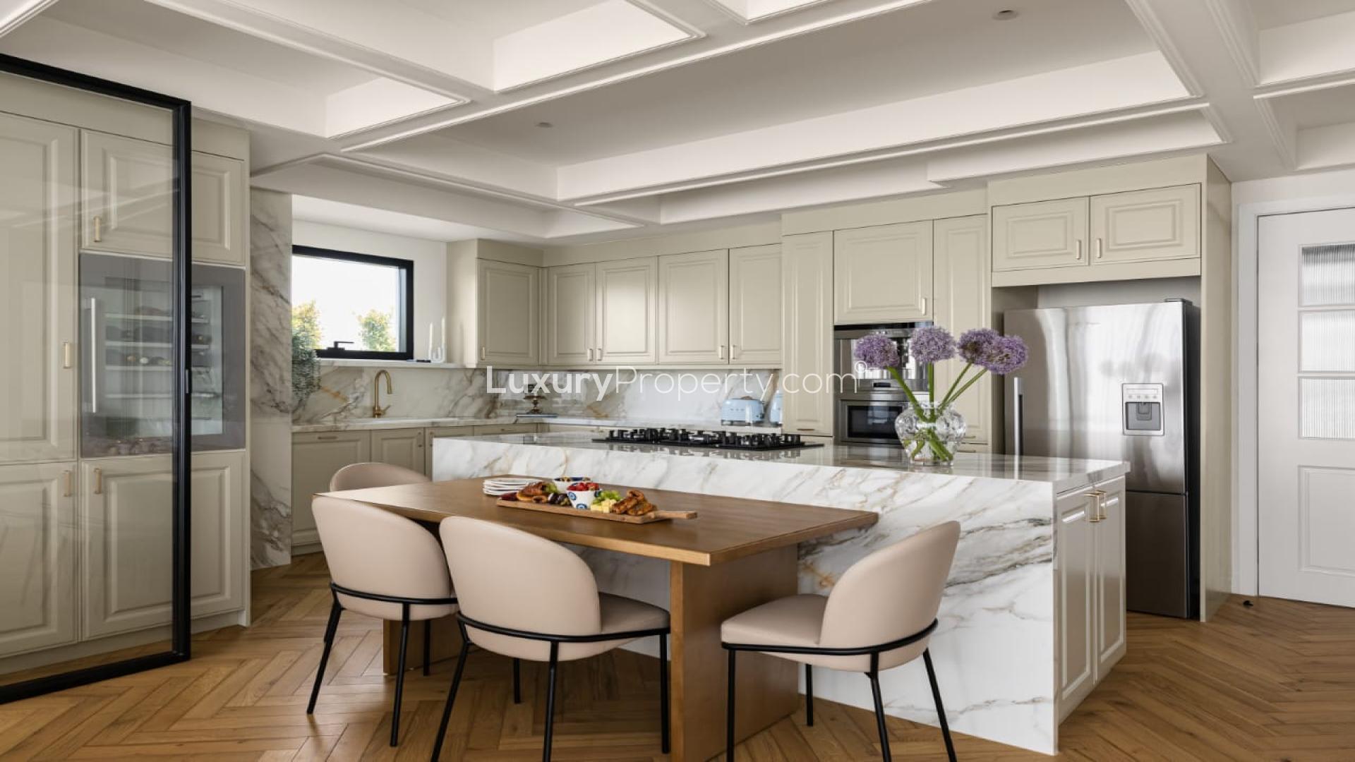 Luxurious Jumeirah Islands villa living room with lake view, modern furniture, and natural light