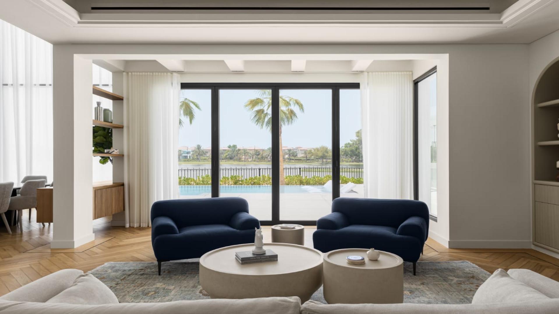 Luxury kitchen in 5-bedroom villa, Jumeirah Islands, featuring marble countertops and modern appliances