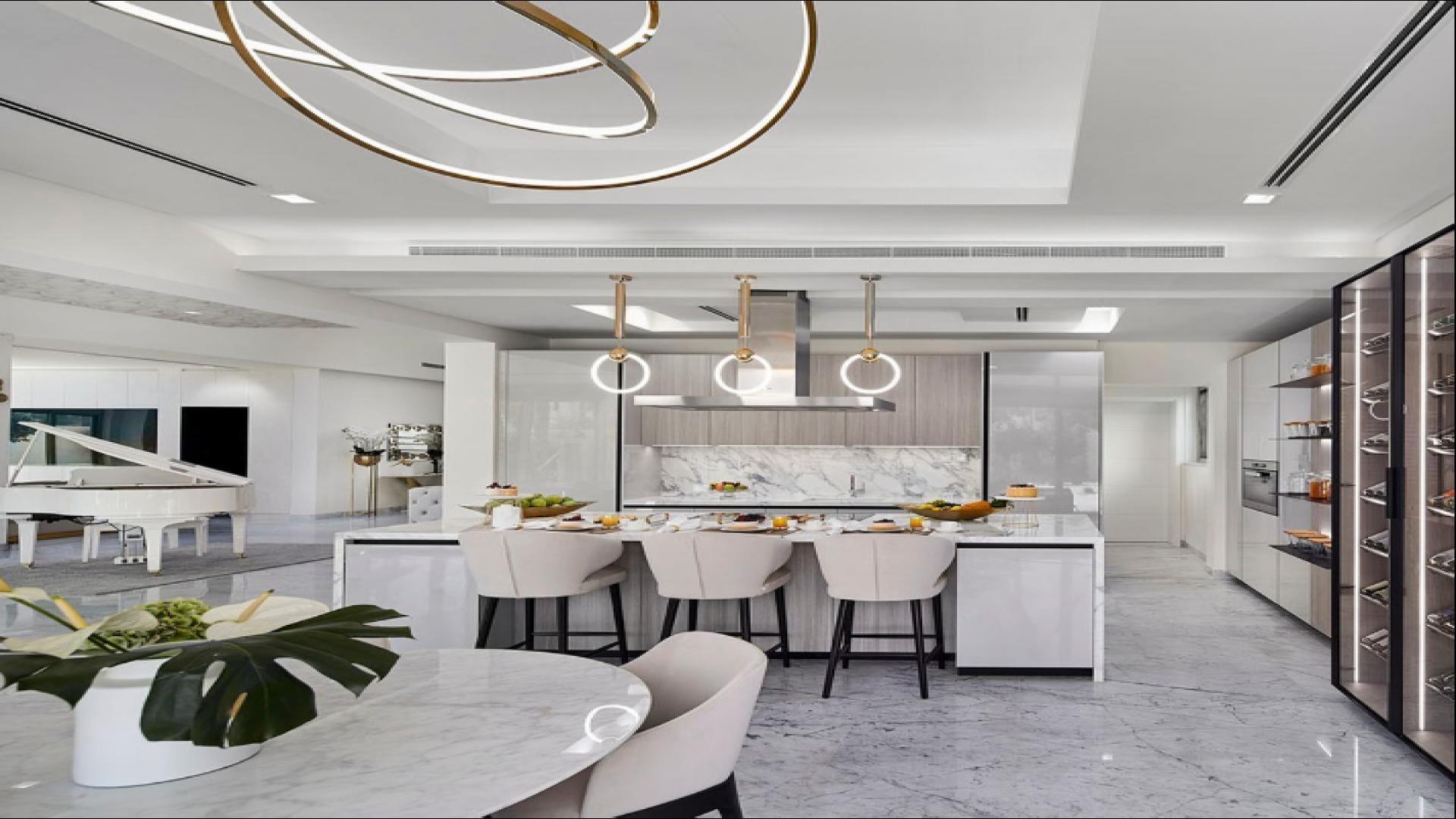 Lakeview villas in Jumeirah Islands, Mediterranean Clusters, reflecting on tranquil water