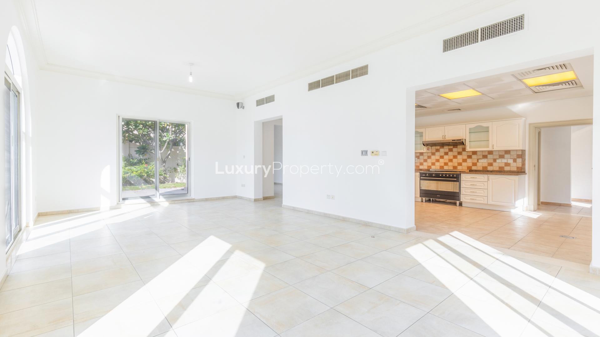 Exquisite 5-bedroom villa exterior with lush garden in Victory Heights, Dubai Sports City