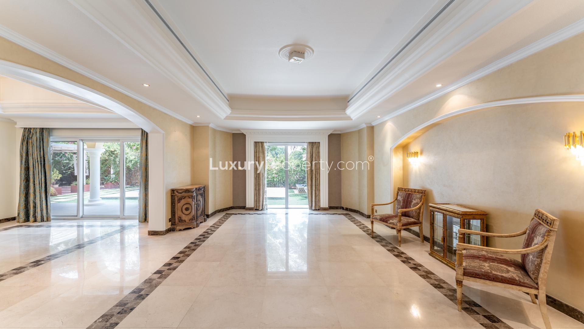 Exquisite villa exterior with lush garden in Green Community West, Dubai, for rent