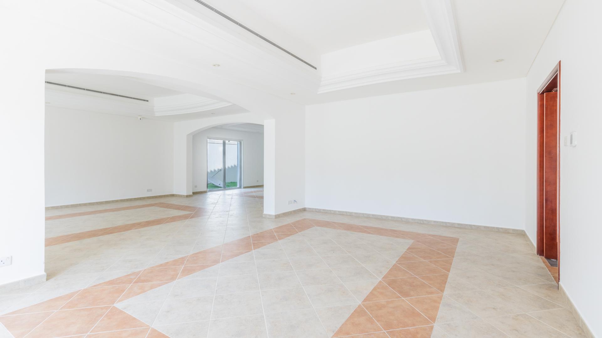 Luxurious 5-bedroom villa exterior with garden in Green Community West for rent