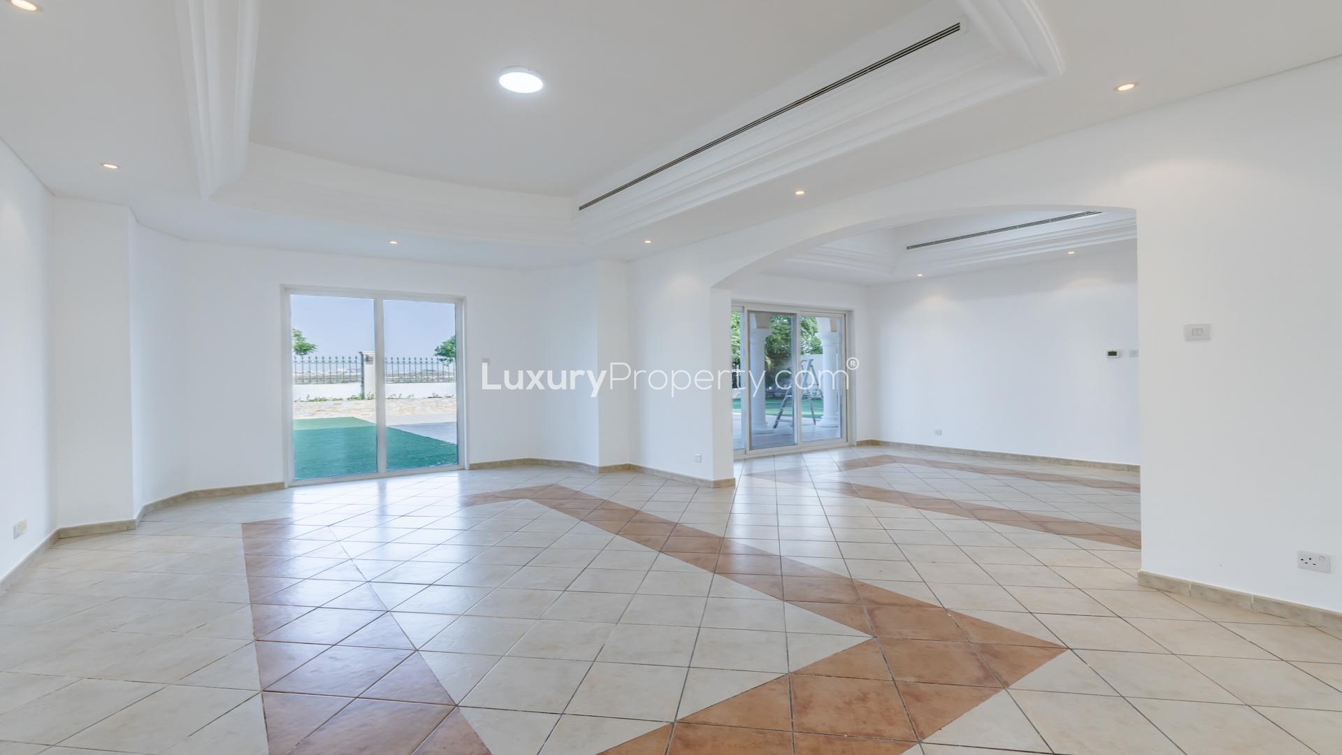 5-bedroom villa exterior with spacious patio in Green Community West, for rent