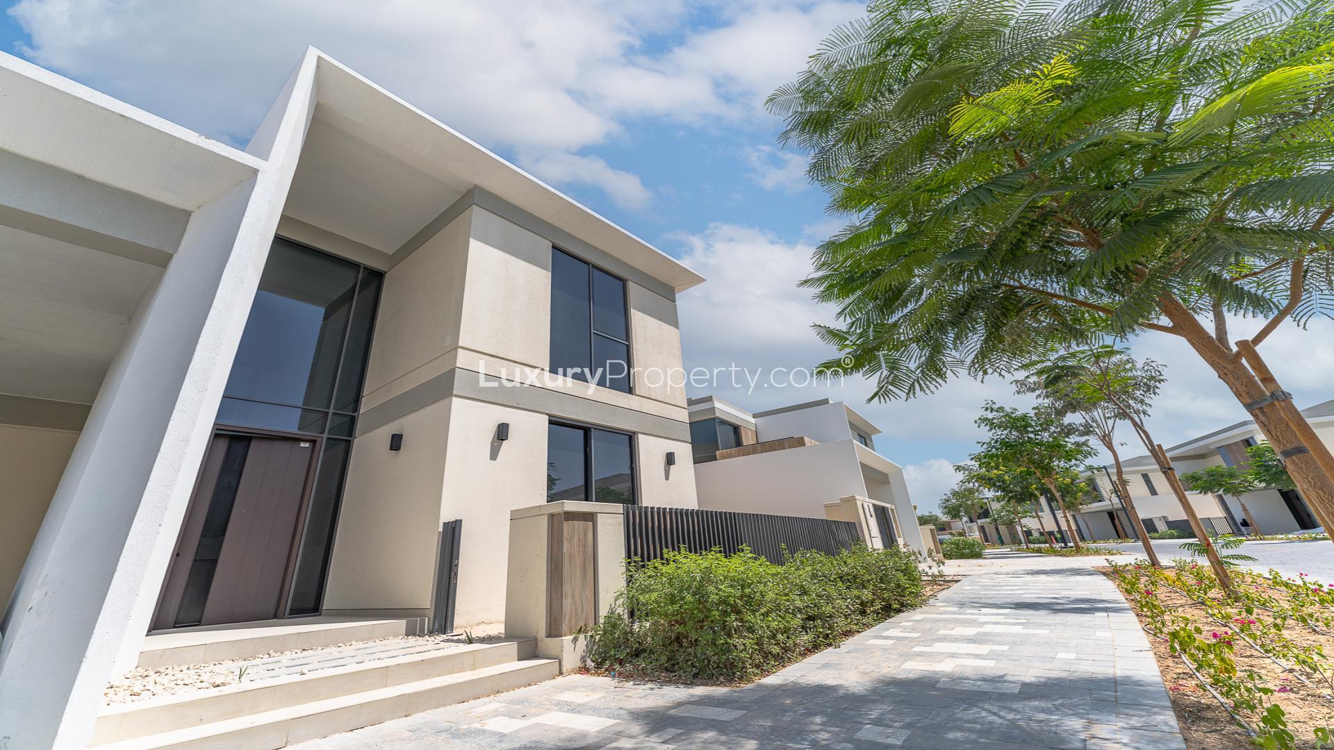 Modern open-plan living area in 5-bedroom villa, Harmony 2, Tilal Al Ghaf