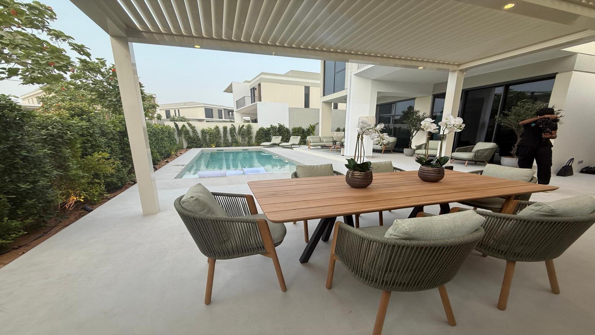 Park-facing villa with modern pool and patio in Harmony 2, Tilal Al Ghaf community