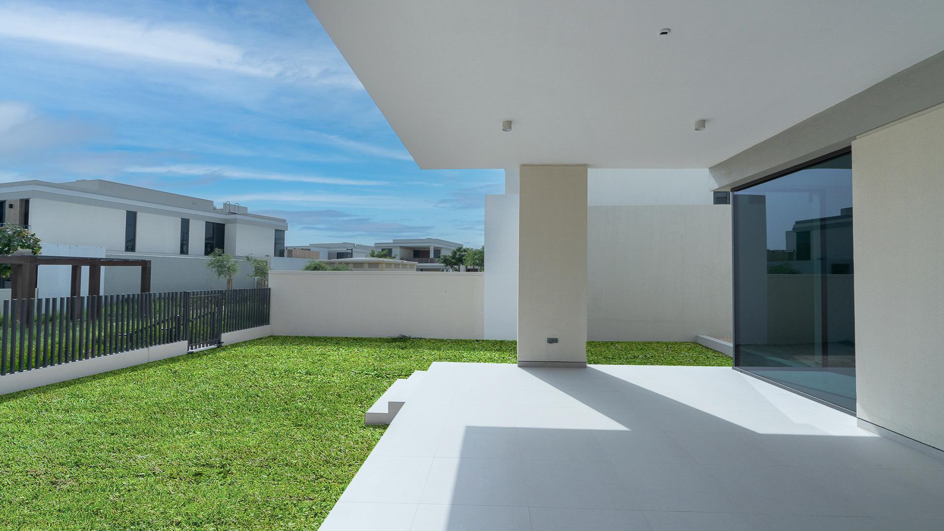 Spacious interior of Vastu-compliant villa in Harmony 2, Tilal Al Ghaf, with large windows