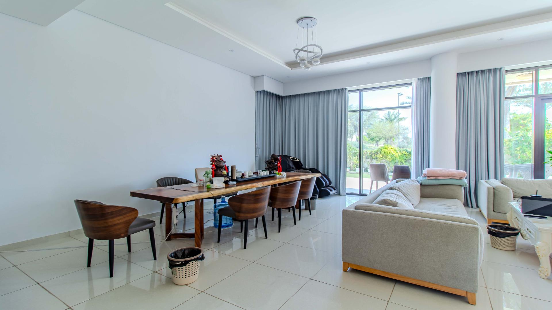 N/A,Luxurious dining and living area in furnished 5-bed villa, Damac Hills, Whitefield