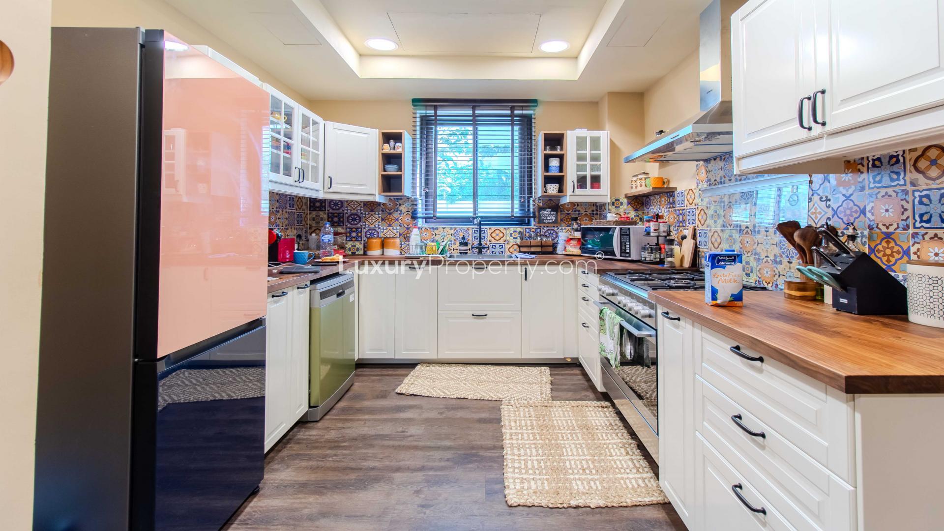 Modern kitchen in luxury 5-bedroom villa, Samara, Arabian Ranches 2, with stylish decor