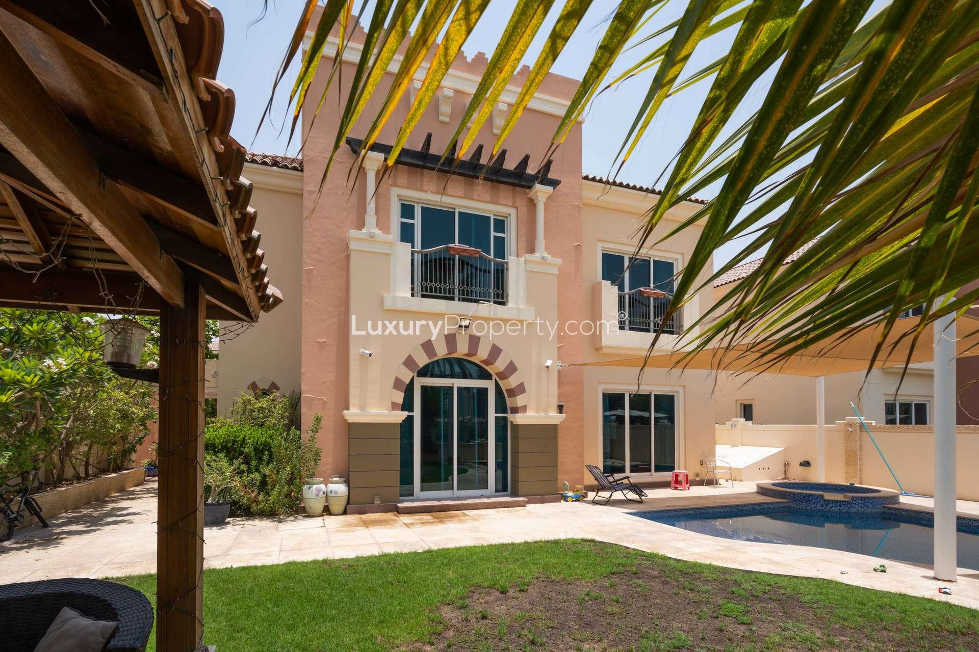 Modern bathroom in Dubai Sports City villa with double sink and large mirror