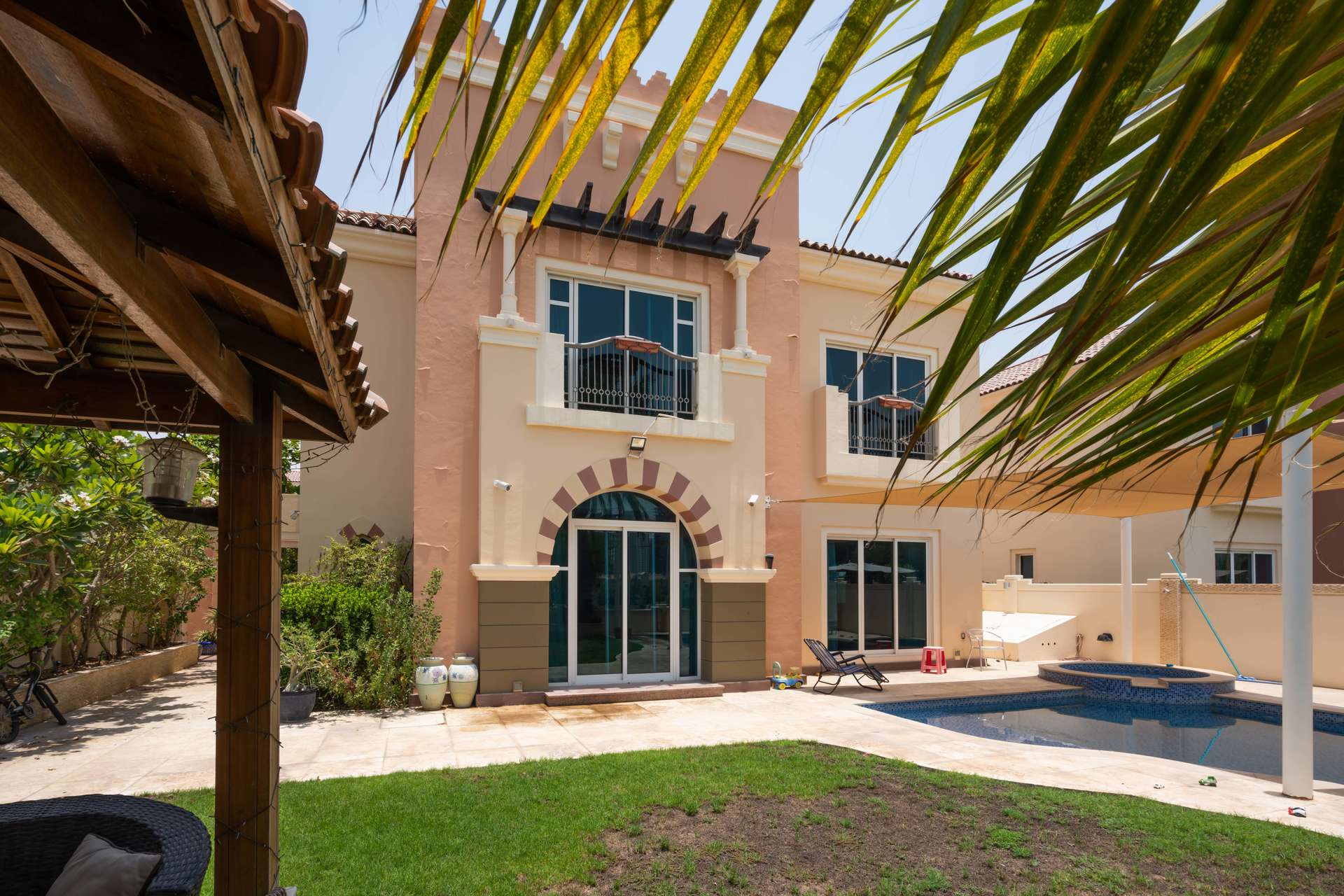 Modern bathroom in Dubai Sports City villa with double sink and large mirror