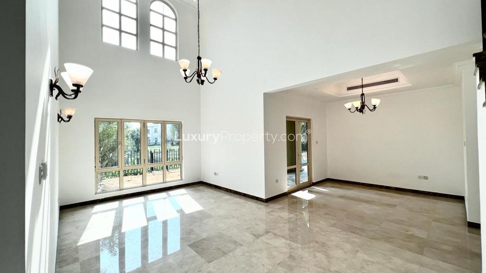 Front view of upgraded villa with landscaped garden in Jumeirah Islands, Cluster 11