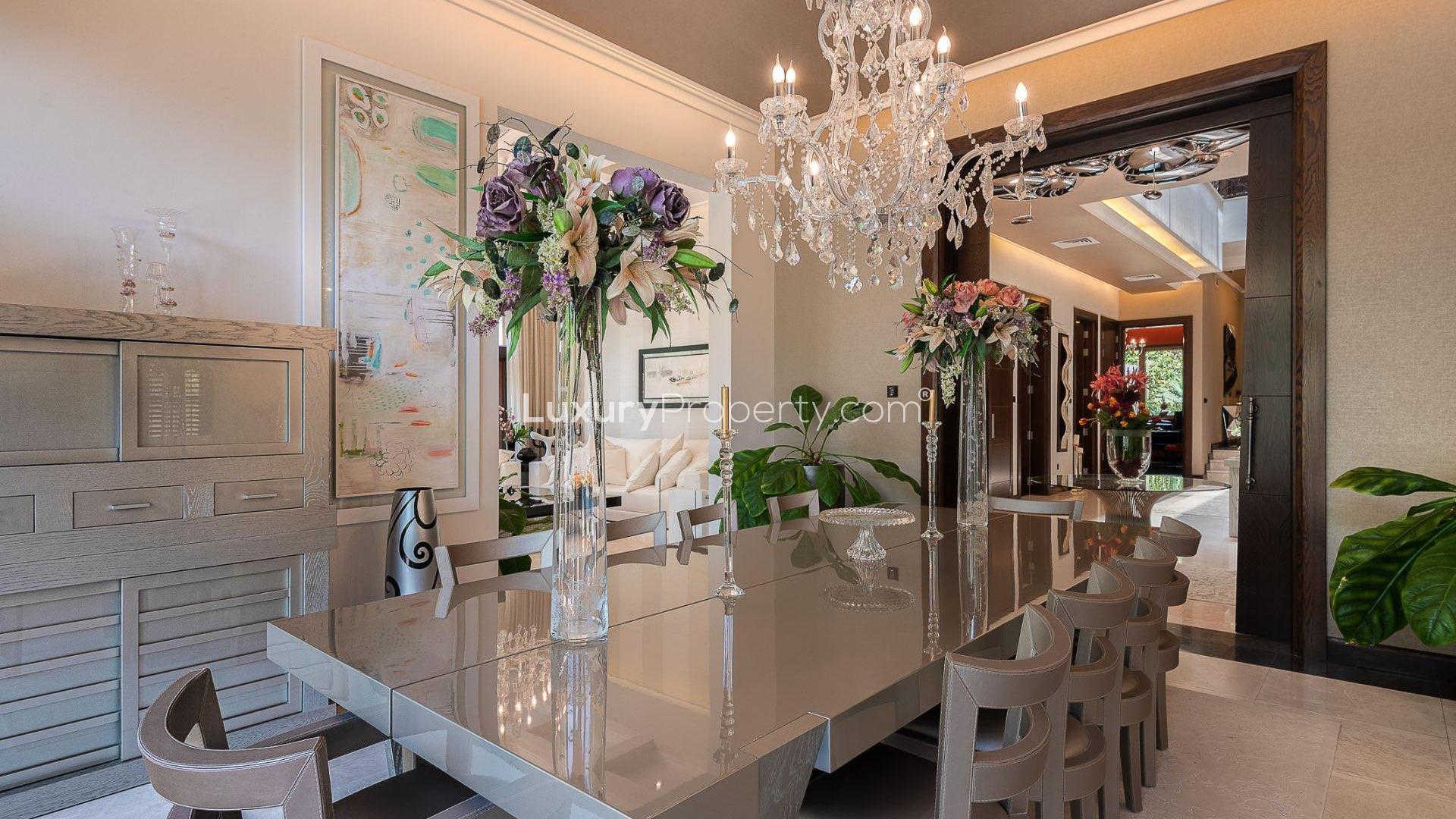 Luxurious Al Barari villa hallway, elegant decor, modern lighting in Ajman Uptown rental