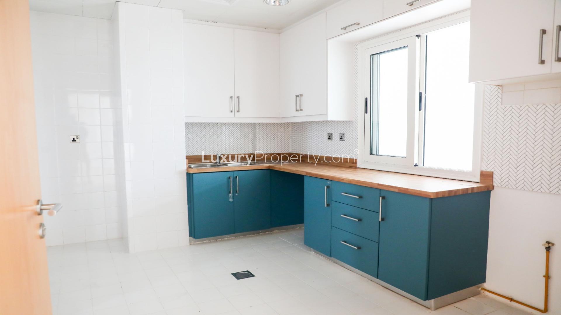 Modern kitchen in luxury 5-bed villa, Palma Residences, Palm Jumeirah, featuring stylish cabinetry