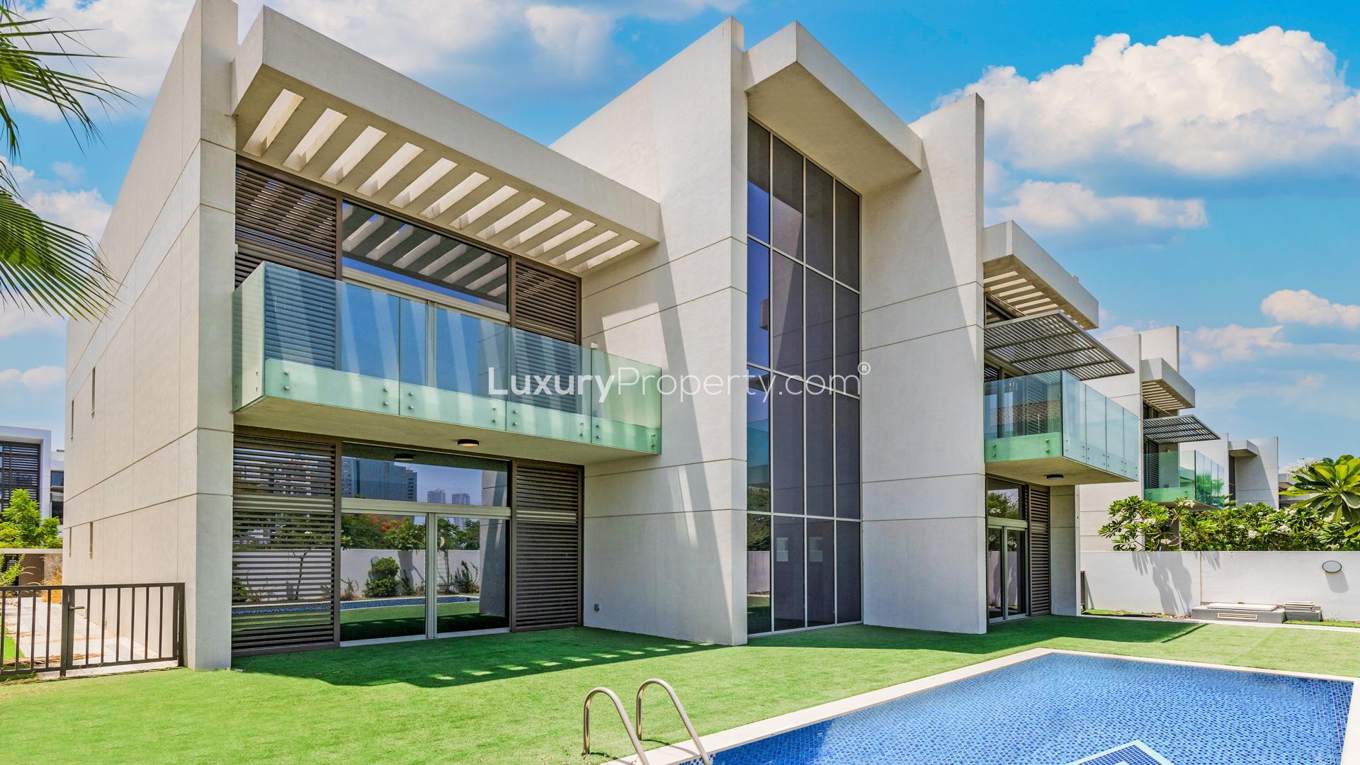 Contemporary villa with landscaped garden and private pool in District One, MBR City