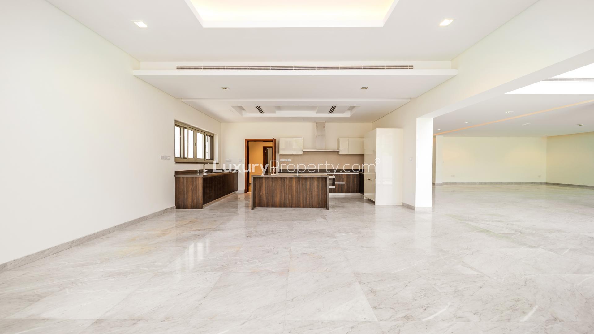 "Luxury villa with pool view in District One, Mohammed Bin Rashid City, for rent.",Spacious modern kitchen in 5-bedroom villa, District One, Mohammed Bin Rashid City