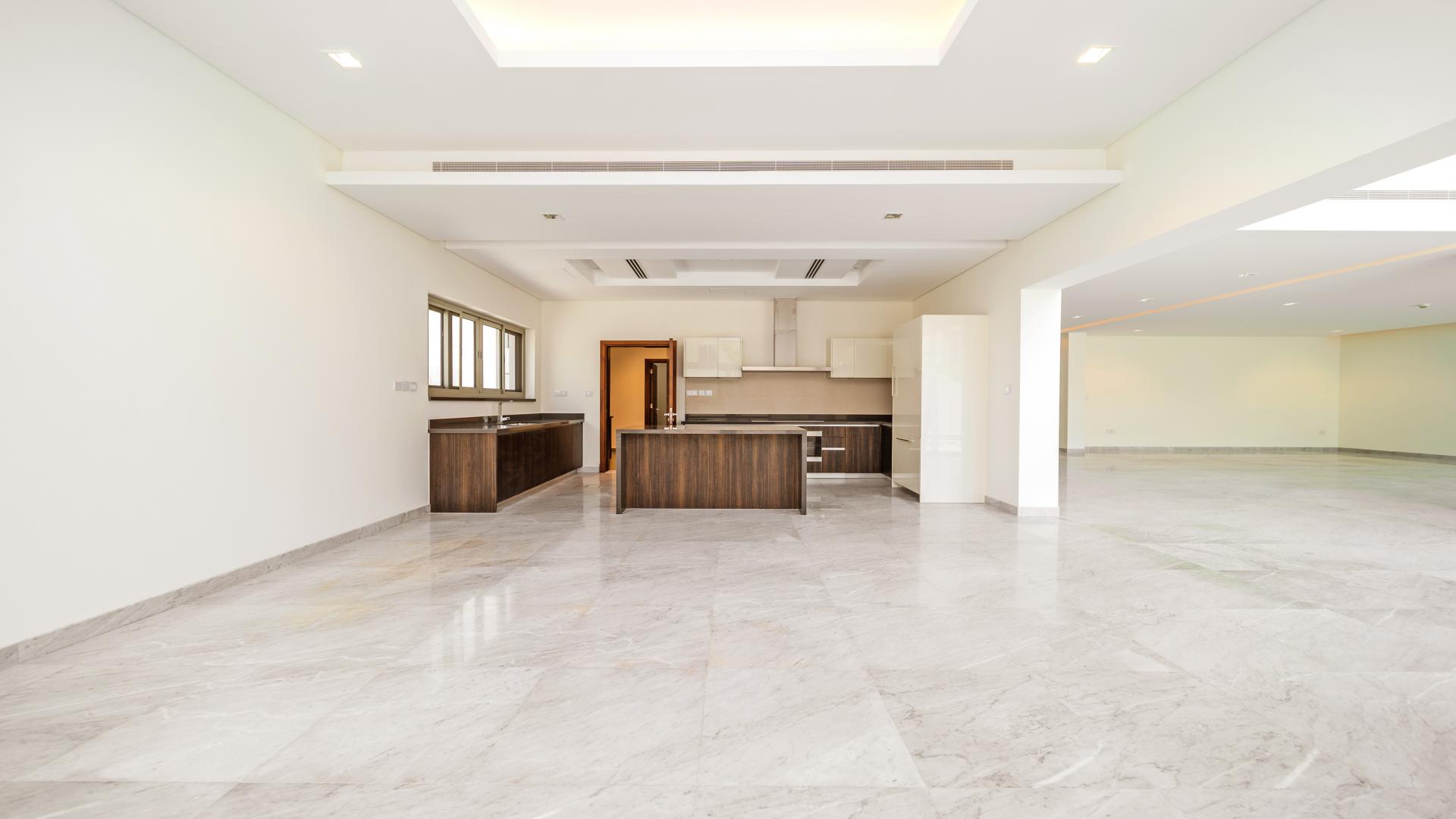 "Luxury villa with pool view in District One, Mohammed Bin Rashid City, for rent.",Spacious modern kitchen in 5-bedroom villa, District One, Mohammed Bin Rashid City