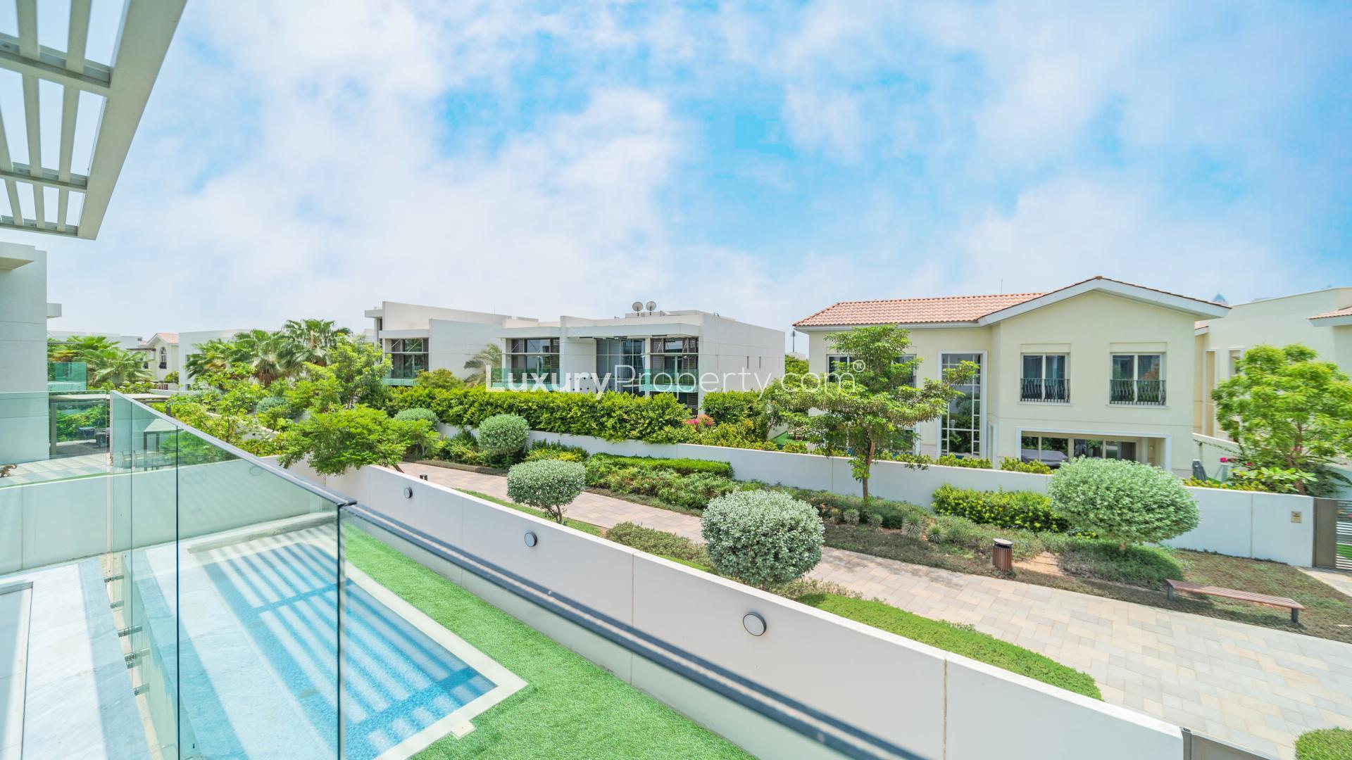 Spacious living area in District One villa with pool view, Mohammed Bin Rashid City