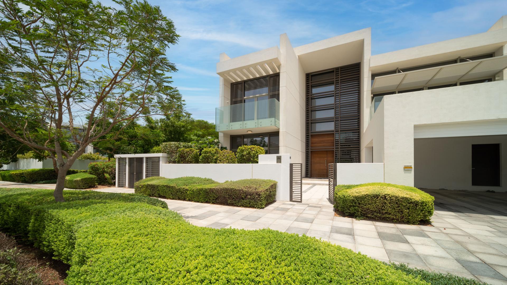 Contemporary villa living room in District One, featuring elegant decor and spacious seating area